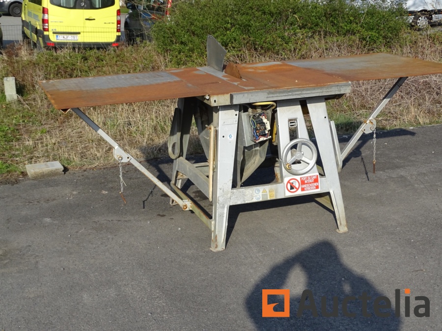 Construction Circular saw AVOLA ZB 4006 on table with extension cords
