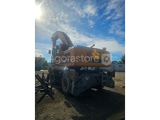 Pelle sur pneus - LIEBHERR A934CHD Litronic - 2008 (photo 4)